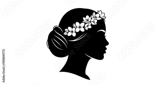 Woman's silhouette with floral hair accessory.