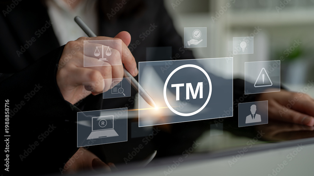 Obraz premium Trademark protection and legal compliance with TM icon, copyright law, patent check, intellectual property rights, and branding regulation enforcement Latch