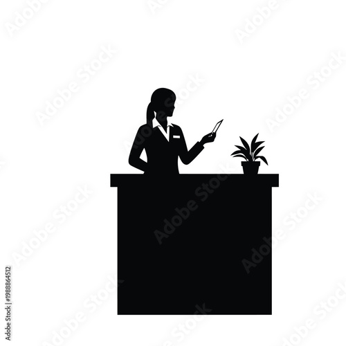 A silhouette of a woman standing behind a desk holding a pen and pointing to a potted plant.