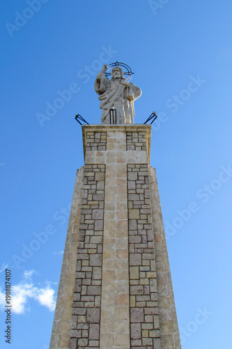 Low angle of the Sacred Heart of Jesus Statue on Cerro del Socorro in Cuenca, Spain