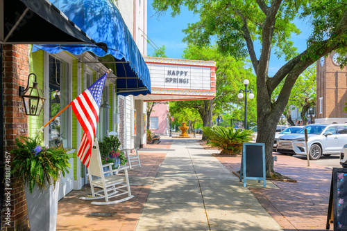 Quadro su tela Vintage theaters, shops and cafes along Front Street, the main street through the early American colonial waterfront town of Georgetown, South Carolina