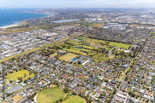 Quadro su tela Altona North aerial view of residential suburb, sports fields and industrial are