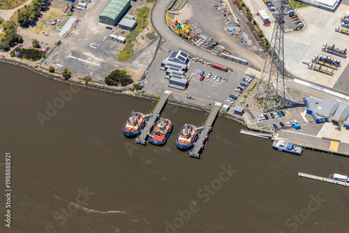 Tableau sur toile port melbourne aerial view tugboats dock waterfront industrial area parking lot