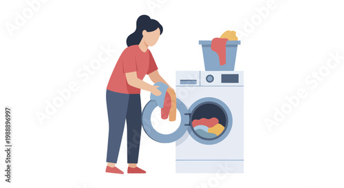 Woman doing laundry, loading clothes into washing machine.