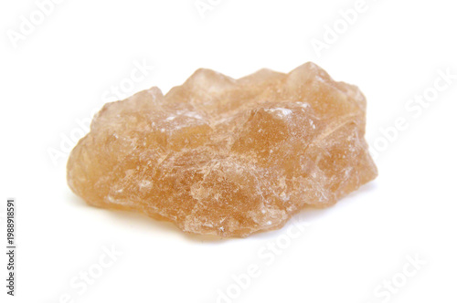 Brown sugar cubes isolated on white background