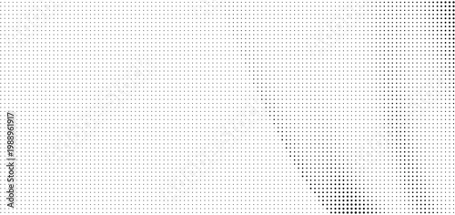 Halftone dots pattern with gradient effect on white background
