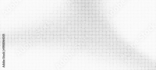 Halftone dots pattern with gradient effect on white background for design

