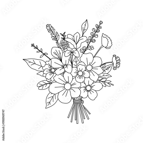 A beautiful spring bouquet of colorful wild flowers with green leaves and a delicate tied stem 