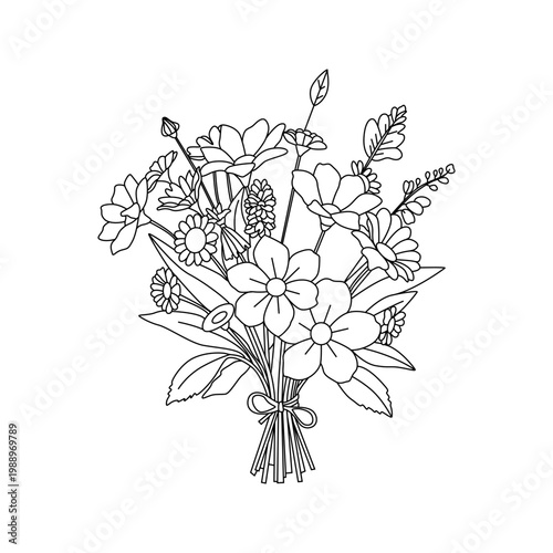 A beautiful spring bouquet of colorful wild flowers with green leaves and a delicate tied stem 