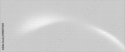 Halftone dots pattern with gradient effect on white background
