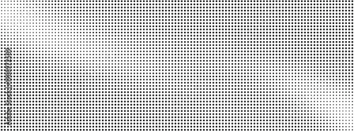 Halftone dots pattern with gradient effect on white background
