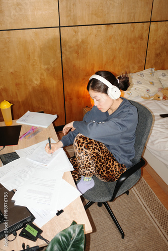 Person studying diligently preparing for upcoming exams