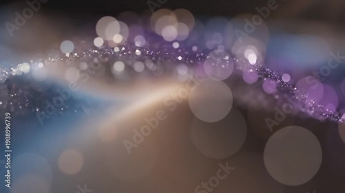 Abstract bokeh light particles background with purple and blue tones