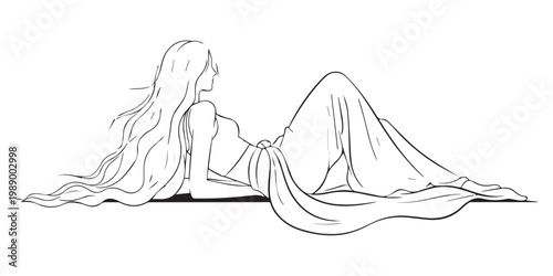 Woman lying on floor with draped fabric.