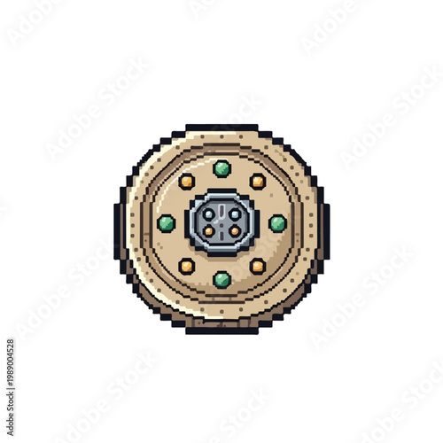 A detailed pixel art illustration of a round ornate shield featuring colorful gems and a central metallic element on a clean white background.