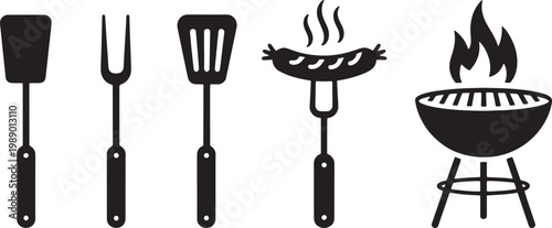 Black and white of barbecue tools and grilling sausage on a fork with a grill spatula