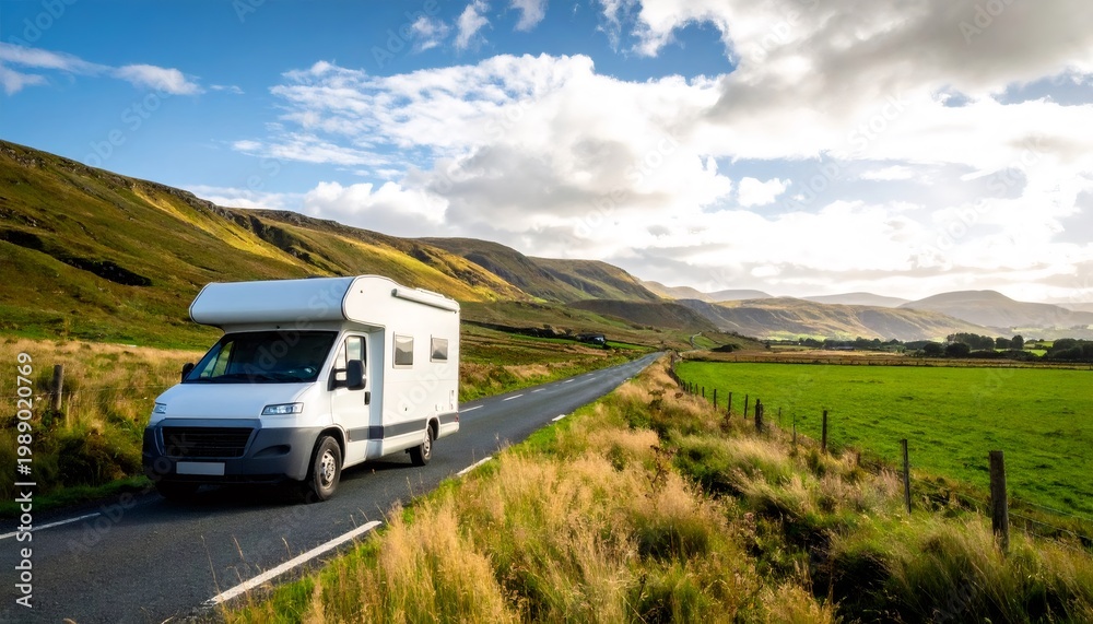 Obraz premium Motorhome driving on rural road in ireland