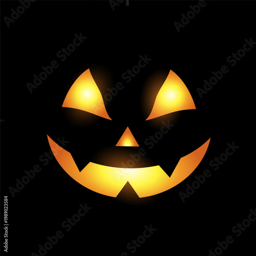 Spooky glowing carved Halloween pumpkin face with bright eyes and a grinning smile on a dark night