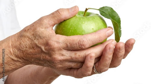 Senior Hands Holding Fresh Green Apple Isolated on White Background