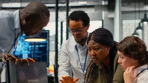 Quadro su tela Scared admins in office panicked by alert, trying to stop hacker intrusion stealing sensitive data