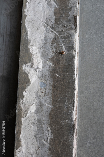 Spacious modern industrial warehouse interior with polished concrete floors, structural pillars, and natural light, showcasing minimalist design, clean space, and architectural perspective.
