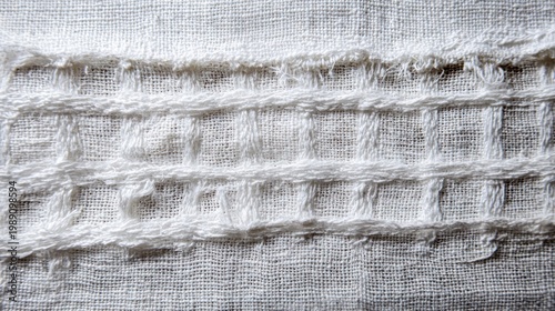 Close up of textured white fabric with layered ridges for various uses