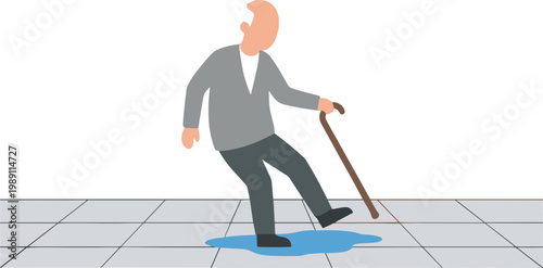 An elderly man slips on a puddle while walking with a cane.