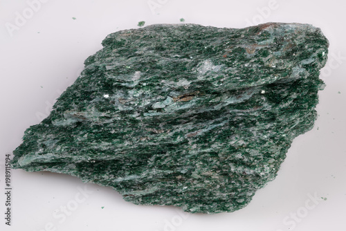 Photos Flat view of green mica with linear foliation and reflective surfaces