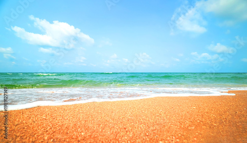 Картината върху платно Stunning tropical beach landscape with crystal clear turquoise water and golden sand under a bright blue sky