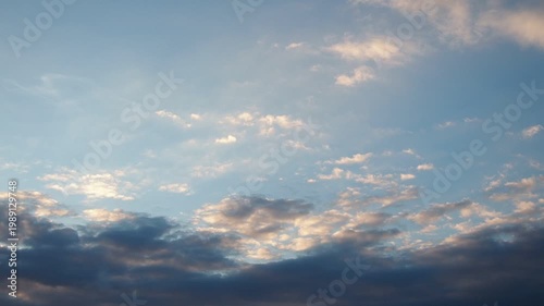 Watch as clouds shift and change in the afternoon sky. Different shapes and colors appear as time goes on, showing the beauty of nature above.