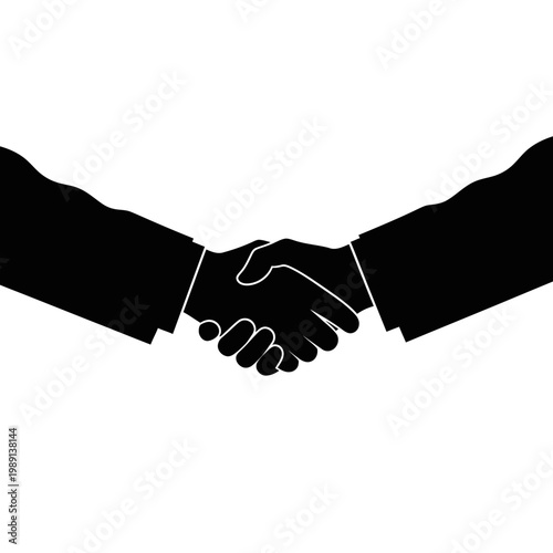 Two business people shaking hands in agreement silhouette.