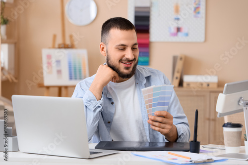 Male interior designer with...