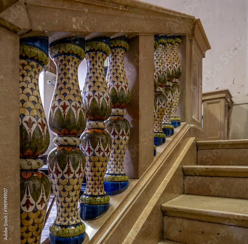 Colored balusters on the ancient staircase in the palace.