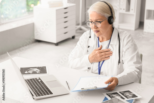 Female doctor with headset ...