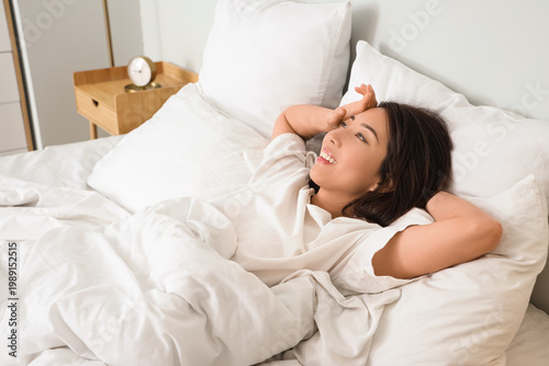 Morning of young Asian woma...