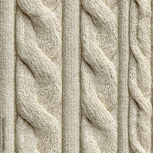 Close-up view of a cream-colored knit fabric with intricate cable stitch patterns and vertical ribs.