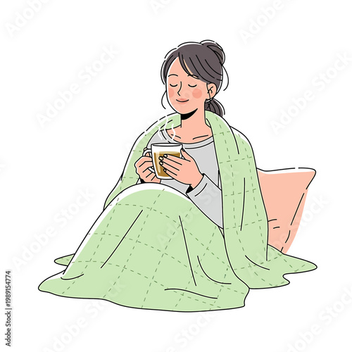 Woman wrapped in blanket holding mug.