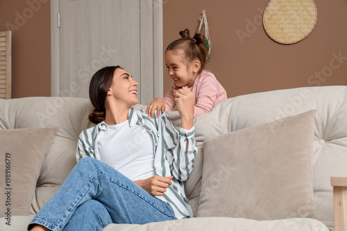Happy mother with her littl...