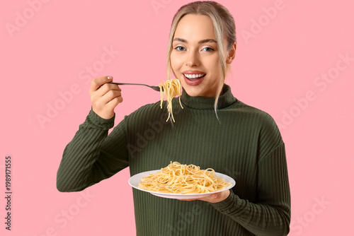 Young woman eating tasty pa...