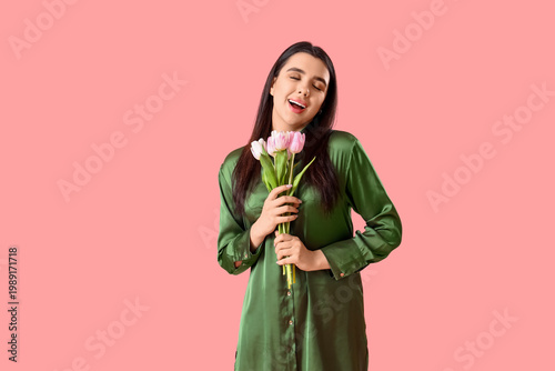Beautiful happy young woman...