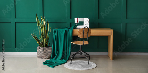 Tailor's workplace with sew...