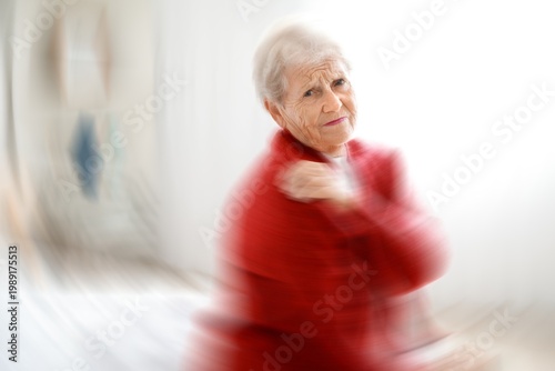 Canvas-taulu Senior woman suffering from dementia at home