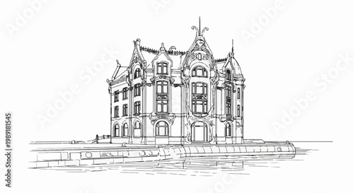 Ornate building with towers and decorative facade stands by water