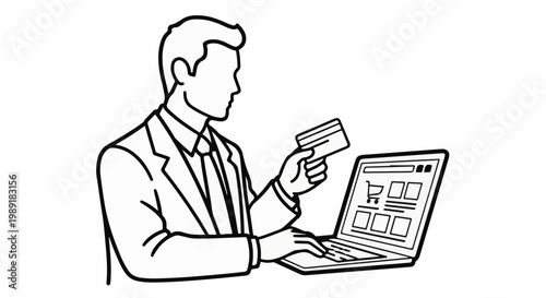 Person in suit paying with credit card on laptop