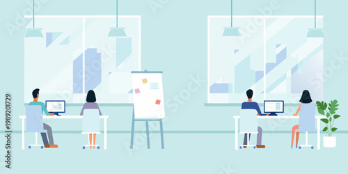 Modern office space with employees working at desks and a meeting area