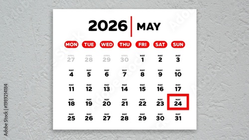 The date May 24th marked with a red cursor on a wall calendar 2026