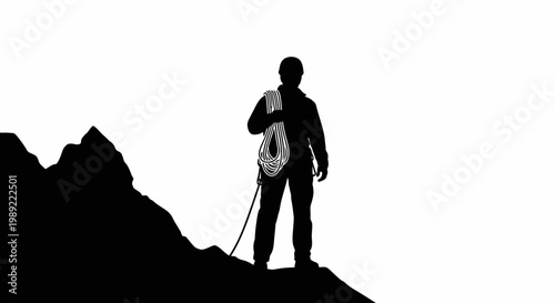 Man standing on mountain peak.