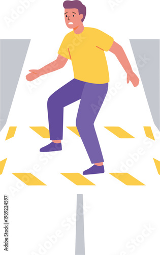 Man wearing yellow shirt and blue jeans jumps over yellow obstacles on floor