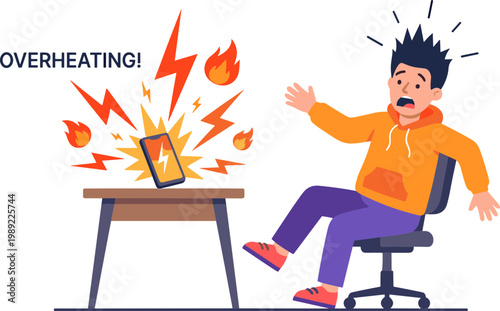 A man sits on a chair next to a table with an overheating laptop.