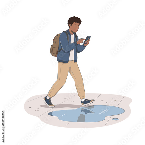 Man walks on sidewalk while looking at phone near puddle